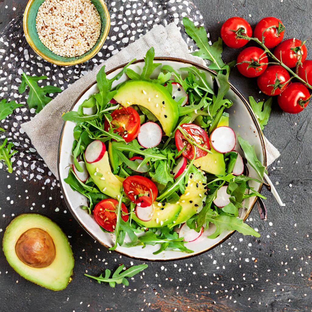 diet-menu-healthy-salad-fresh-vegetables-tomatoes-avocado-arugula-radish-seeds-bowl-vega